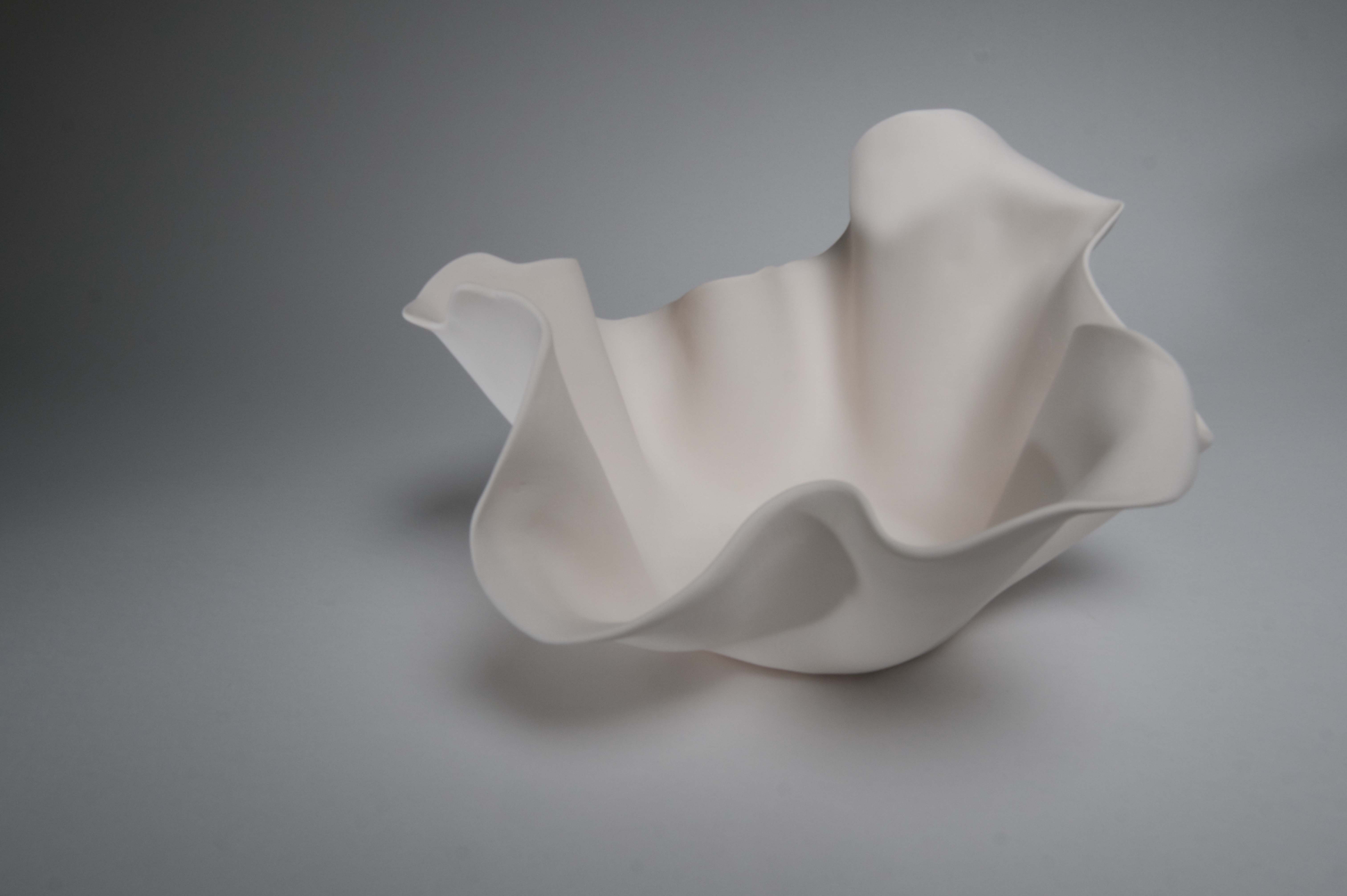 Handbuilt wavy porcelain bowl